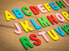  colorful letters on wood